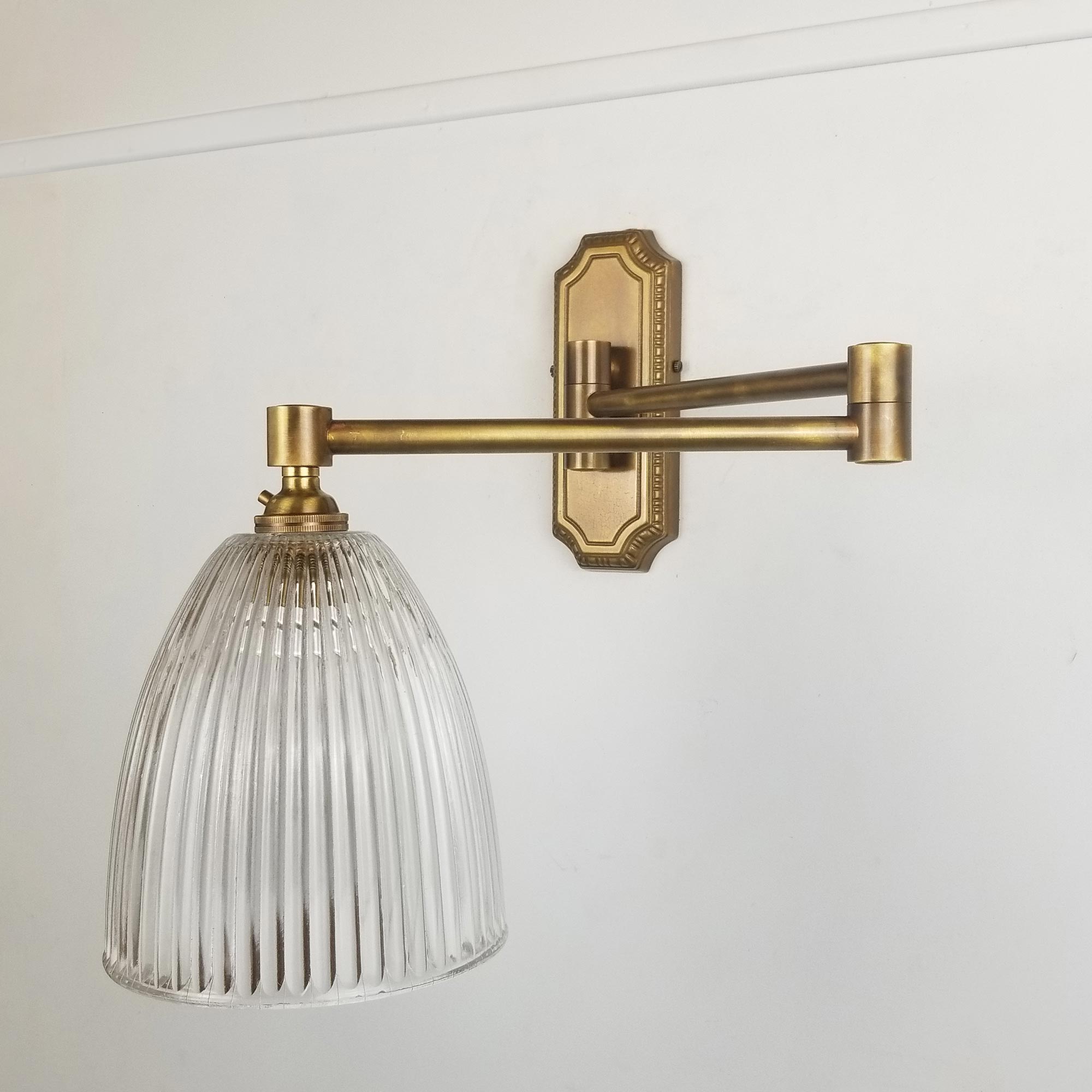 Double Swing Arm Brass Wall Light with Prismatic Glass Shade - E2 Contract  Lighting