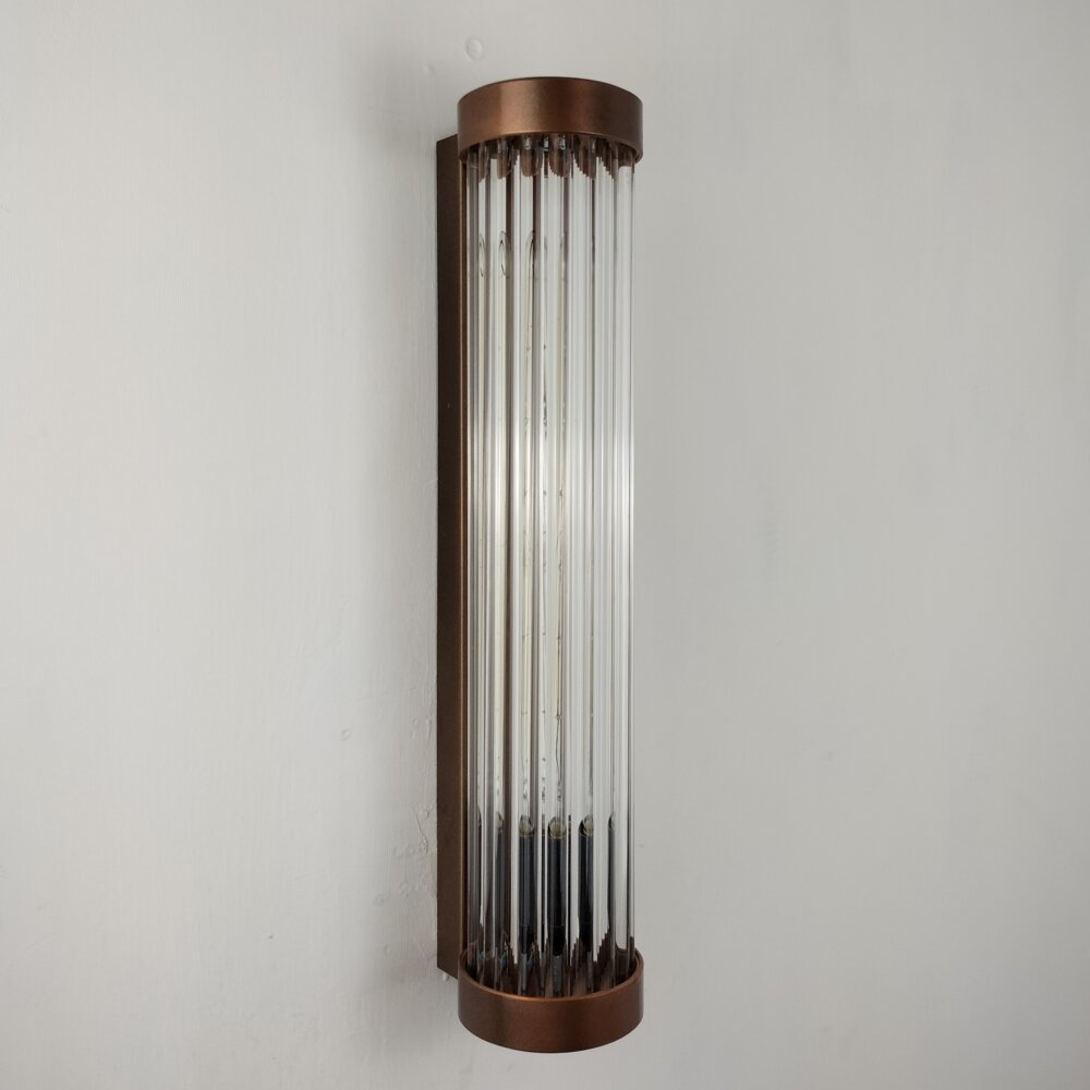 extended glass rod brass wall light detail