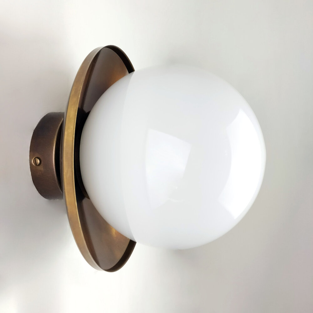 brass dish wall light with opal glass globe shade