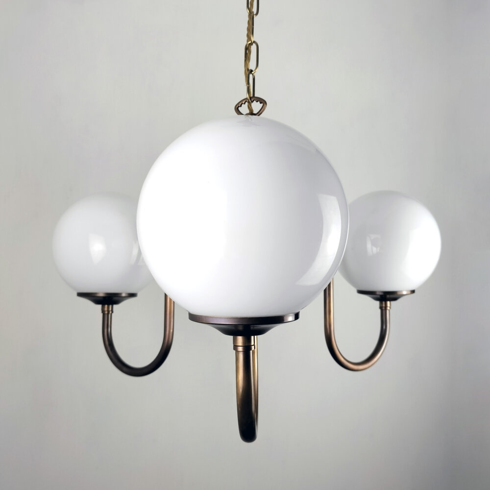 three swan arm chandelier with opal glass globes